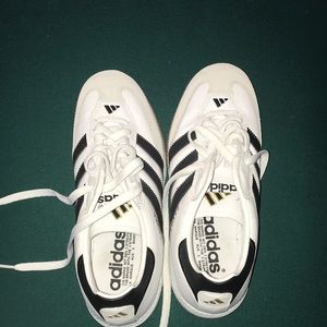 Unisex Adidas black and white shoes